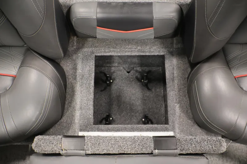 Slide: The Image of 2022 Tracker Pro Team 175 TXW boat interior with storage compartment and cushioned seats. - 34
