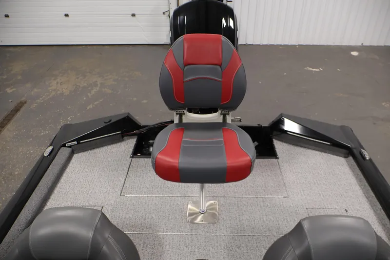 Slide: The Image of 2022 Tracker Pro Team 175 TXW boat interior with red and gray seating. - 35
