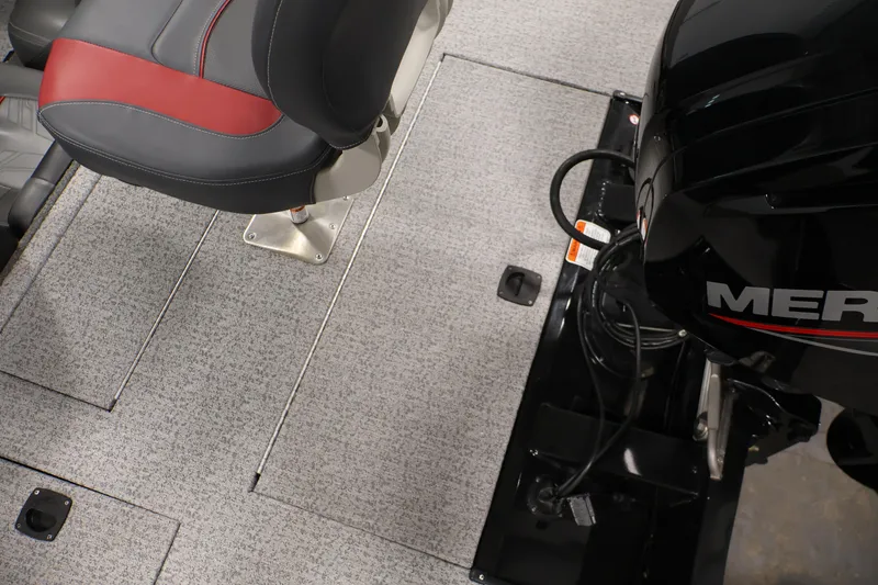 Slide: The Image of 2022 Tracker Pro Team 175 TXW boat interior with seat and engine detail. - 39