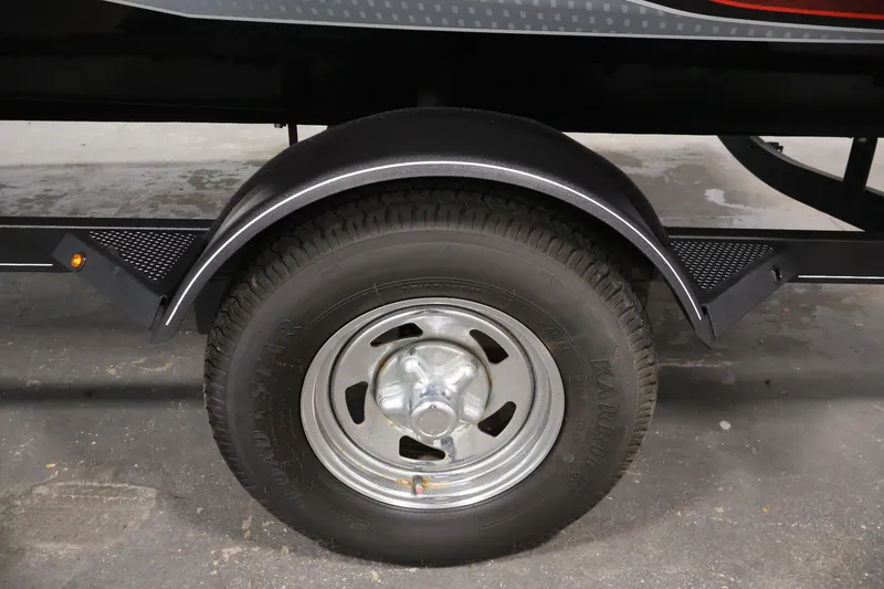 Slide: The Image of 2022 Tracker Pro Team 175 TXW trailer wheel and fender detail. - 47