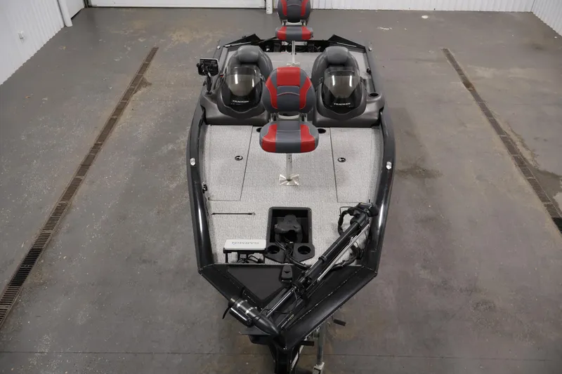 Slide: The Image of 2022 Tracker Pro Team 175 TXW fishing boat with dual seats and trolling motor. - 9