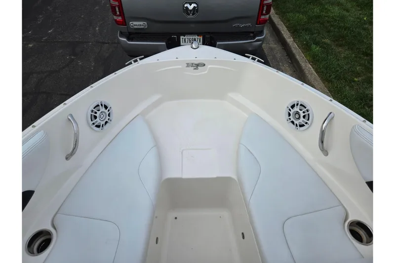 Slide: The Image of Bow view of 2016 Chaparral 19 H2O Sport boat with speakers and seating. - 18