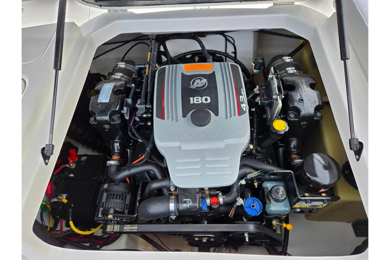 Slide: The Image of 2016 Chaparral 19 H2O Sport engine compartment with MerCruiser 4.3L V6 engine. - 25