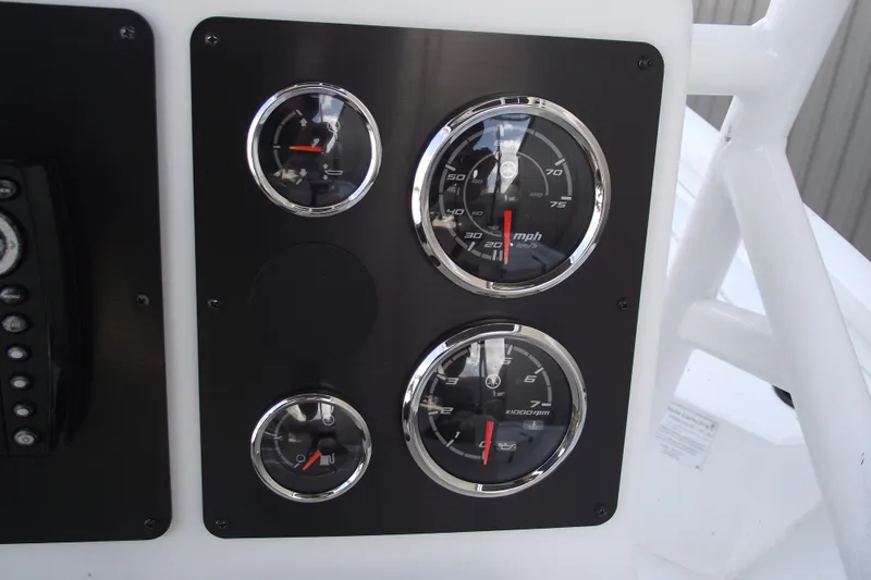 Slide: The Image of Dashboard gauges of 2023 G3 Bay 20 GX boat, featuring speedometer and tachometer. - 17