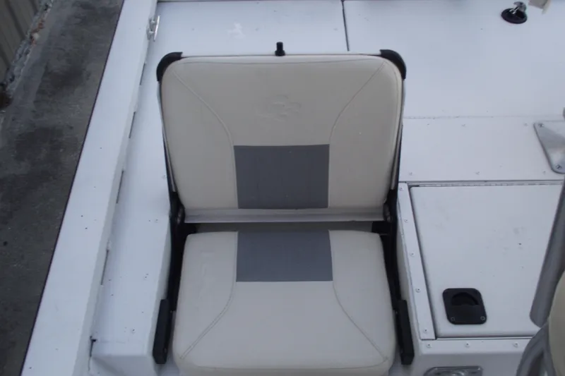 Slide: The Image of 2023 G3 Bay 20 GX boat seat, featuring beige and gray upholstery. - 24