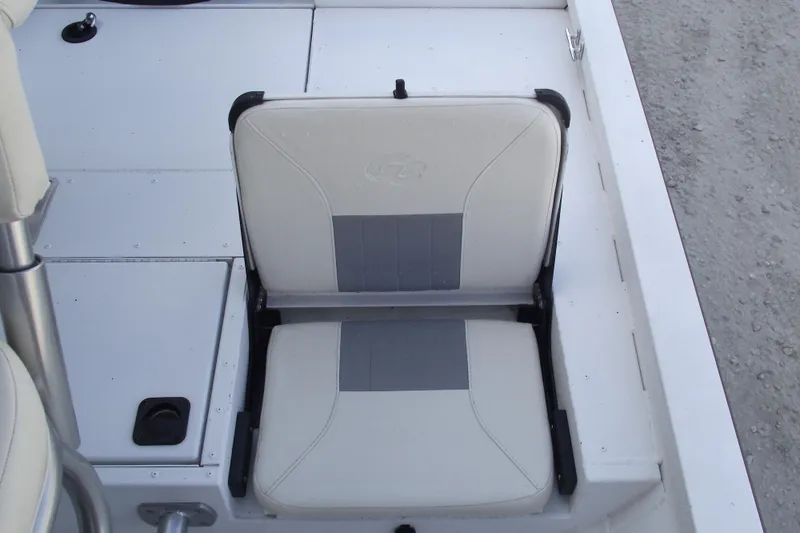 Slide: The Image of 2023 G3 Bay 20 GX boat seat with gray and white upholstery. - 26