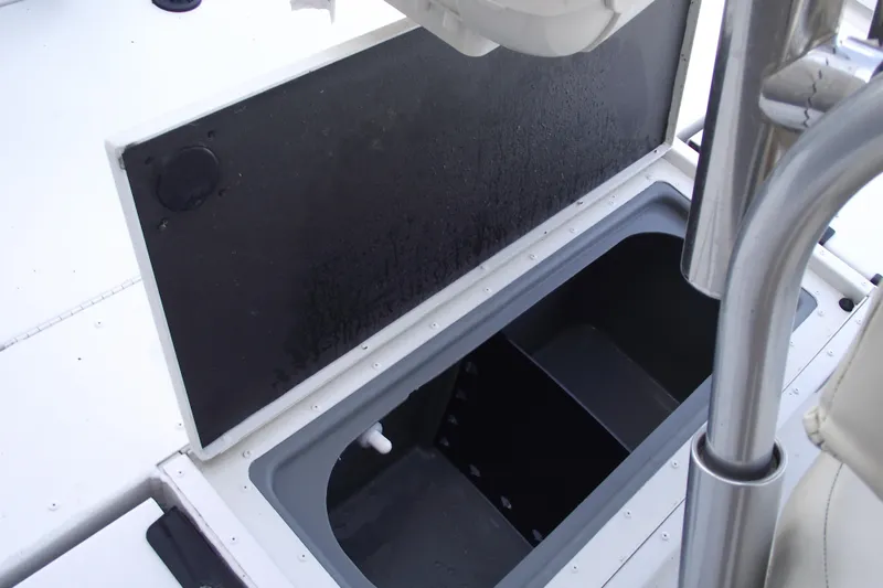 Slide: The Image of Open storage compartment on 2023 G3 Bay 20 GX boat deck. - 28