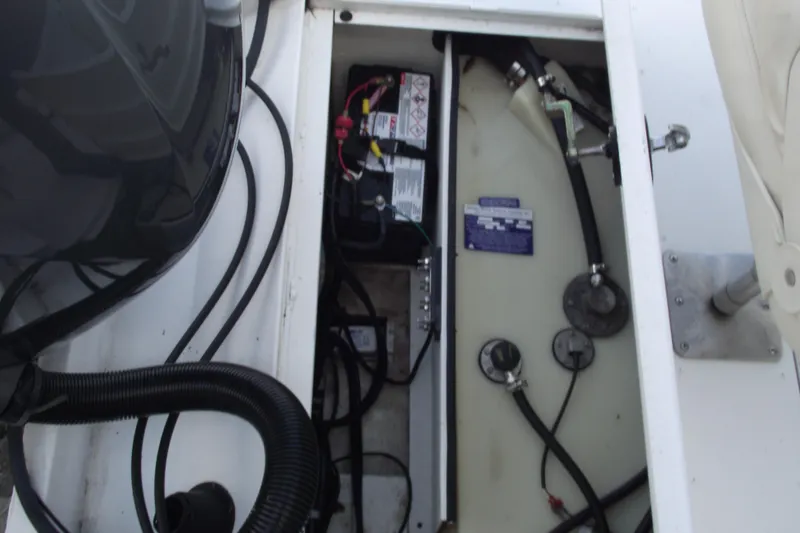 Slide: The Image of Interior view of 2023 G3 Bay 20 GX boat showing battery and wiring components. - 29