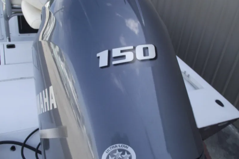 Slide: The Image of 2023 G3 Bay 20 GX boat with Yamaha 150 horsepower engine, showcasing sleek design. - 5
