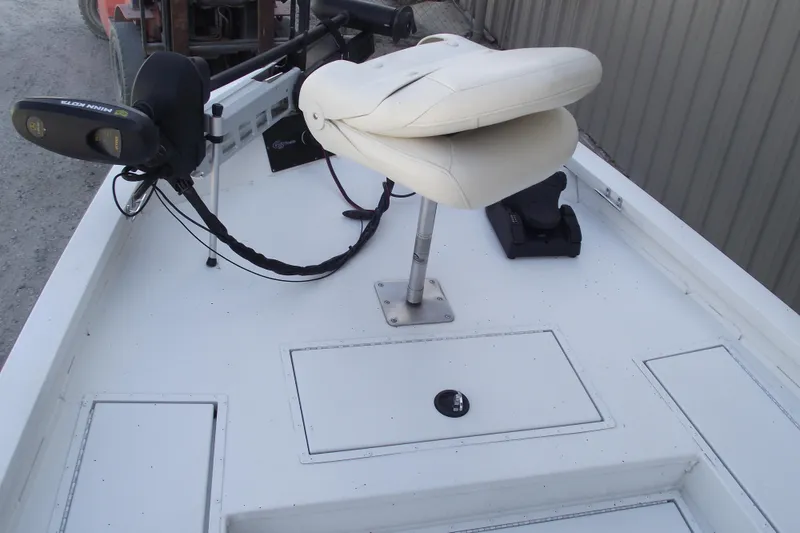 Slide: The Image of 2023 G3 Bay 20 GX boat deck with seat and trolling motor. - 7