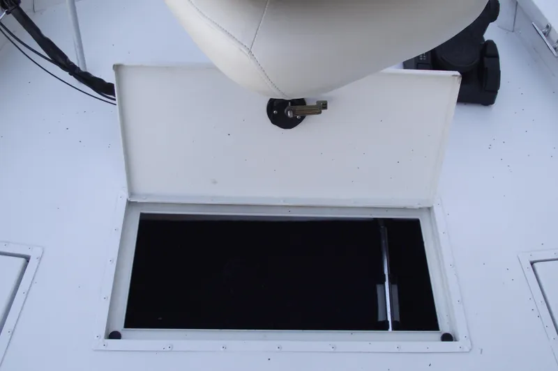Slide: The Image of 2023 G3 Bay 20 GX boat storage compartment under seat. - 8