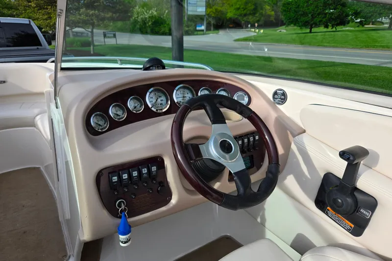 Slide: The Image of 2000 Chaparral 186 SSi boat dashboard with steering wheel and instrument panel. - 11