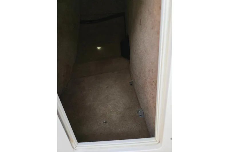 Slide: The Image of Interior storage compartment of 2000 Chaparral 186 SSi boat. - 14