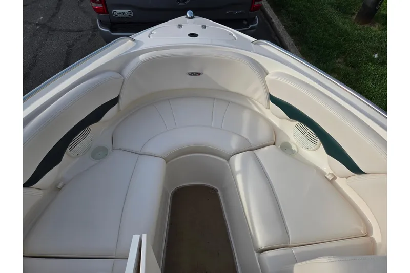Slide: The Image of Interior view of 2000 Chaparral 186 SSi boat with white seating and speakers. - 15