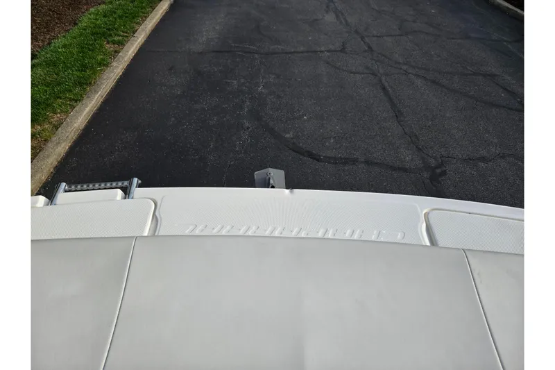 Slide: The Image of Rear view of a 2000 Chaparral 186 SSi boat on pavement. - 22