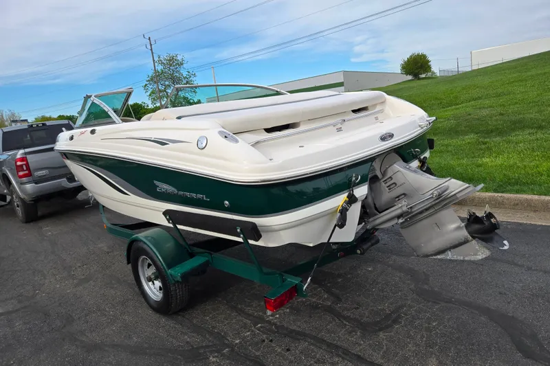 Slide: The Image of 2000 Chaparral 186 SSi boat on trailer, parked outdoors, rear view. - 3