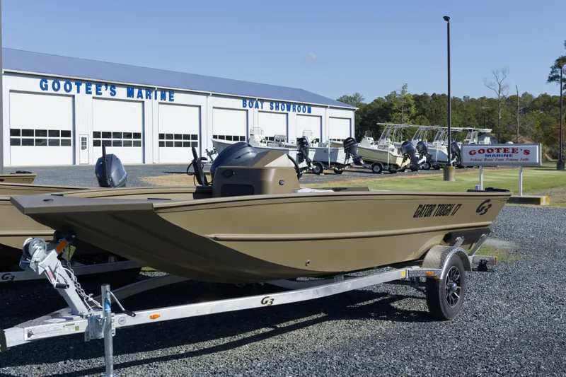 Slide: The Image of 2026 G3 Gator Tough 17 SC boat on trailer at Gootee's Marine showroom. - 3