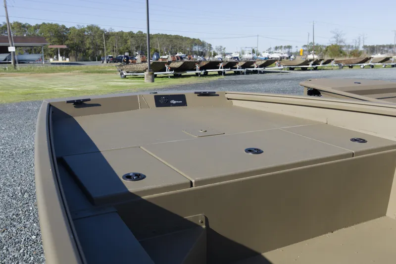Slide: The Image of 2026 G3 Gator Tough 17 SC boat, showcasing spacious deck and storage compartments. - 7