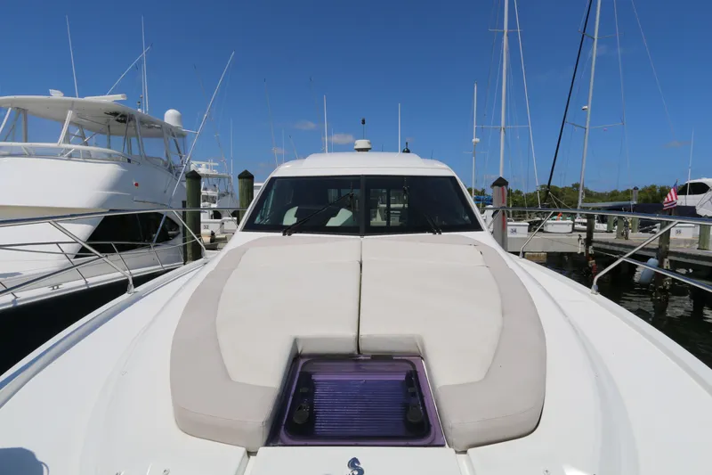 Slide: The Image of 2019 Beneteau Gran Turismo 50 yacht docked at marina under clear blue sky. - 17