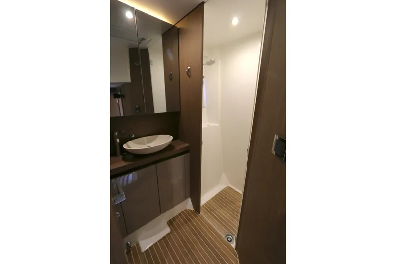 Slide: The Image of Luxurious bathroom interior of 2019 Beneteau Gran Turismo 50 yacht with modern fixtures. - 9