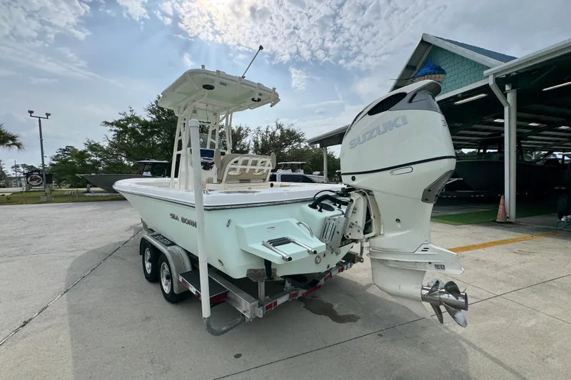 Slide: The Image of 2019 Sea Born FX25 Bay boat with Suzuki outboard motor on trailer. - 15