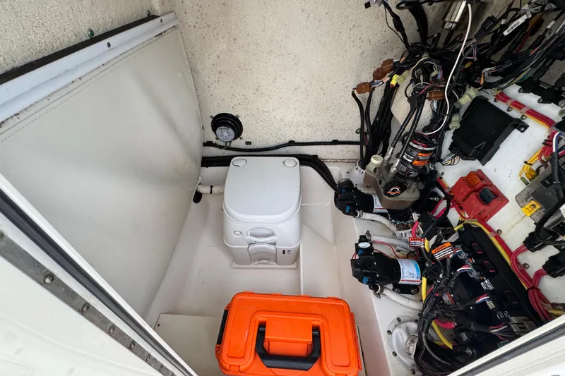 Slide: The Image of 2019 Sea Born FX25 Bay boat interior with wiring and equipment. - 27