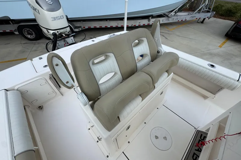 Slide: The Image of 2019 Sea Born FX25 Bay boat interior with dual seats and Suzuki 350 engine. - 34