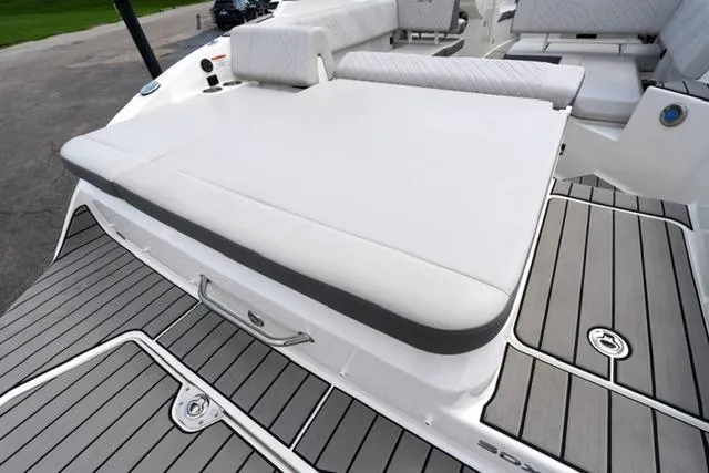 Slide: The Image of 2025 Sea Ray SDX 270 boat with spacious seating and sleek deck design. - 19