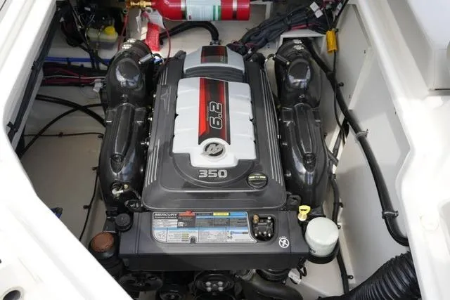 Slide: The Image of Engine compartment of 2025 Sea Ray SDX 270 with 6.2L 350 horsepower engine. - 20