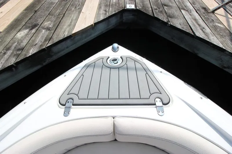 Slide: The Image of 2015 Cruisers Sport Series 238 Bow Rider docked at wooden pier. - 30