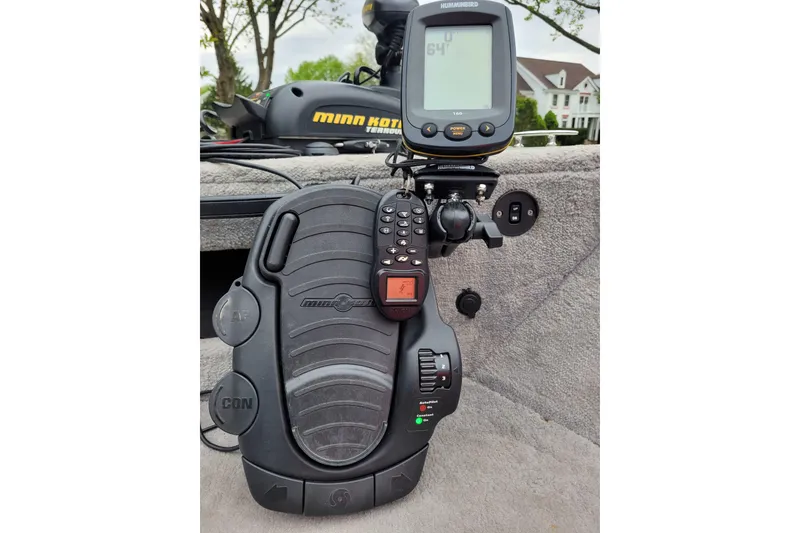 Slide: The Image of Foot pedal and fish finder on a 2011 Starweld 1800 boat, featuring Minn Kota and Humminbird equipment. - 10