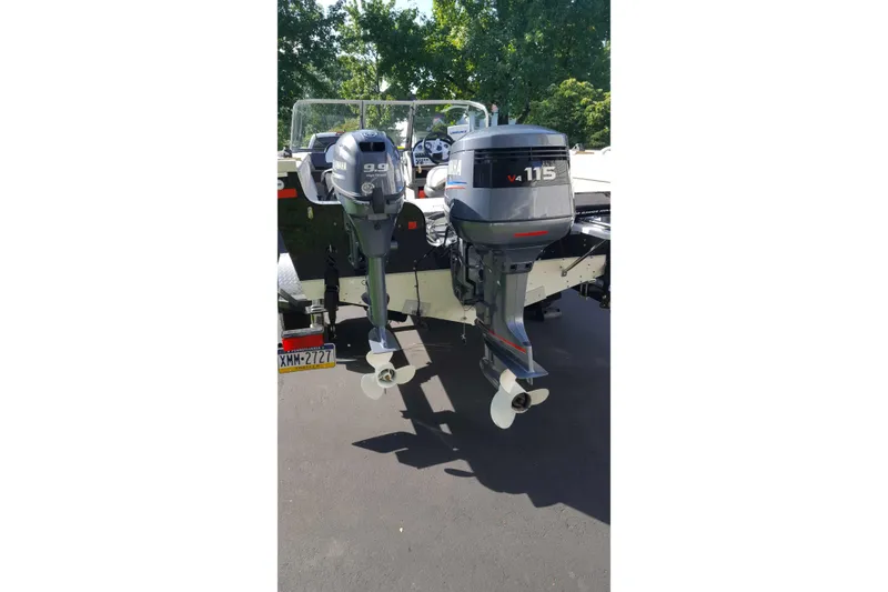 Slide: The Image of Starweld 1800 boat with Yamaha outboard motors, 2011 model, parked outdoors. - 18