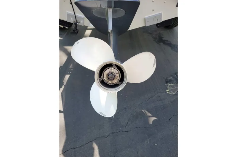 Slide: The Image of Propeller of a 2011 Starweld 1800 boat on a concrete surface. - 4