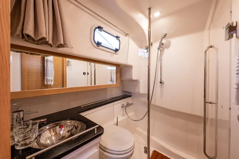 Slide: The Image of Luxurious bathroom interior of 2022 Nimbus 365 Coupe yacht with modern fixtures. - 17