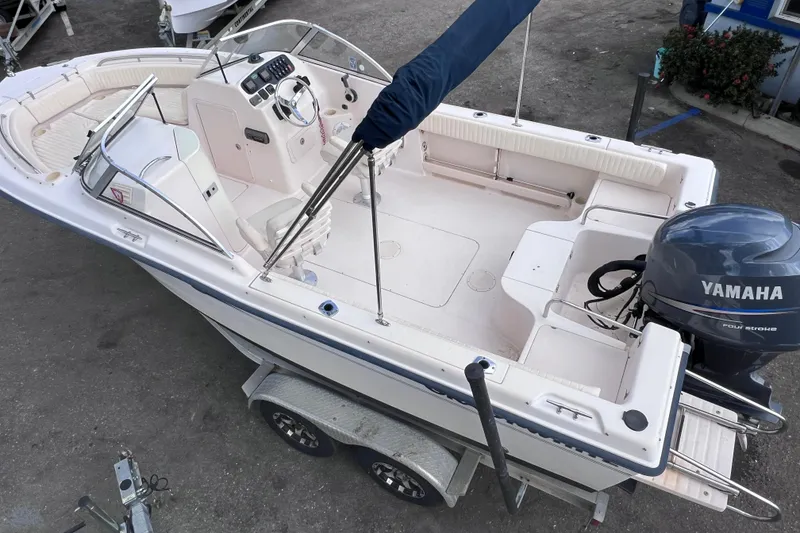 Slide: The Image of 2006 Grady-White Tournament 205 boat with Yamaha engine on trailer. - 12