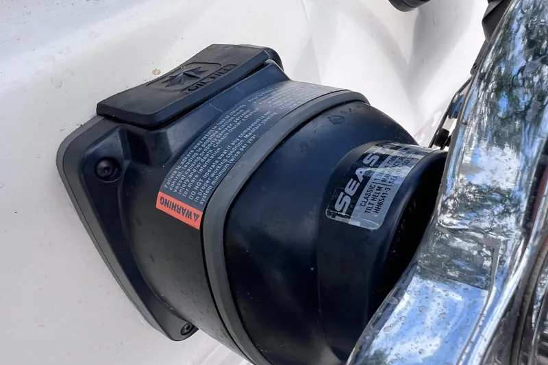 Slide: The Image of Close-up of a 2006 Grady-White Tournament 205 boat component with warning label. - 36