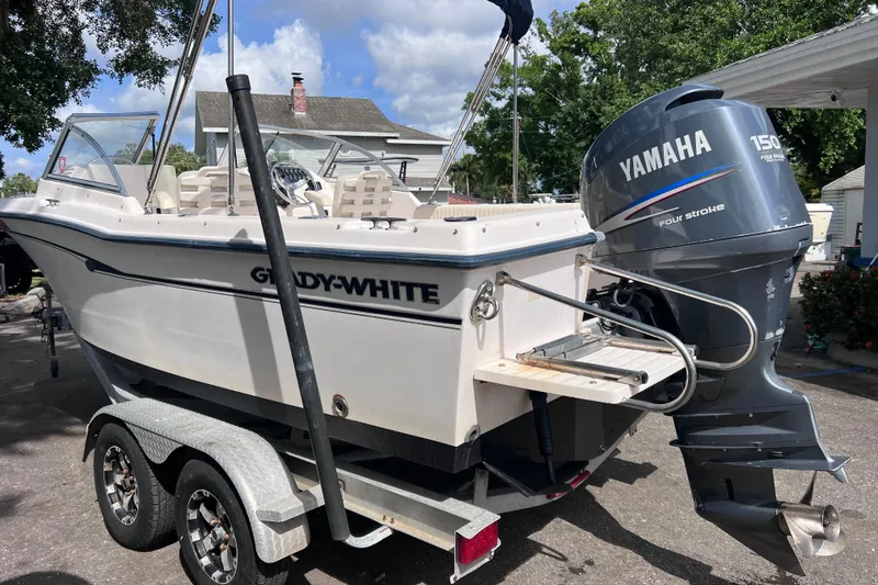 Slide: The Image of 2006 Grady-White Tournament 205 boat with Yamaha 150 engine on trailer. - 4
