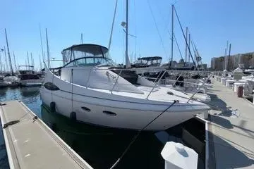 Slide: The Image of 2002 Carver 350 Mariner yacht docked at marina under clear blue sky. - 4
