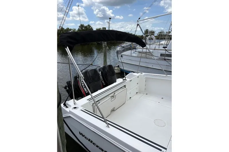 Slide: The Image of 2000 Wellcraft Coastal 290 with 300 h.p. Suzuki Outboards - 3