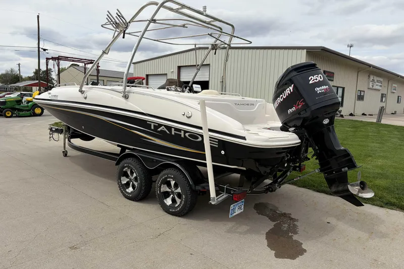 Slide: The Image of 2007 Tahoe 215 OB boat with Mercury 250 engine on trailer. - 7