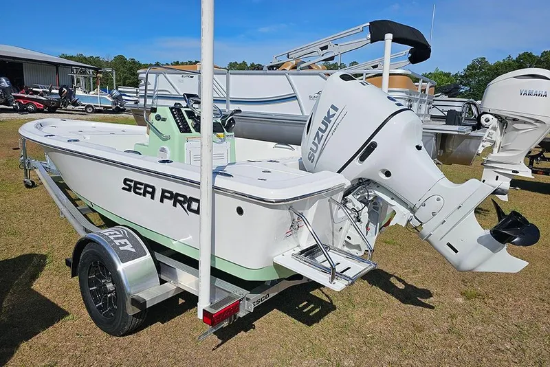 Slide: The Image of 2026 Sea Pro 172 Bay boat with Suzuki outboard motor on trailer. - 11
