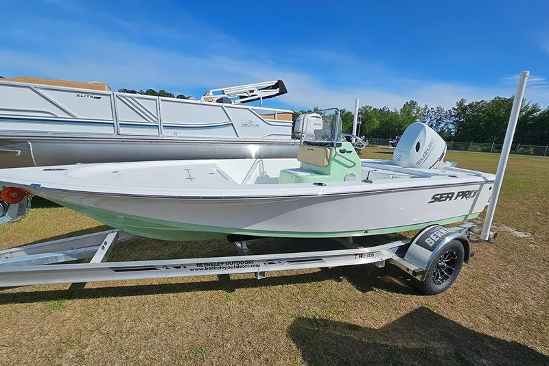 Slide: The Image of 2026 Sea Pro 172 Bay boat deck with storage compartments and sleek design. - 17