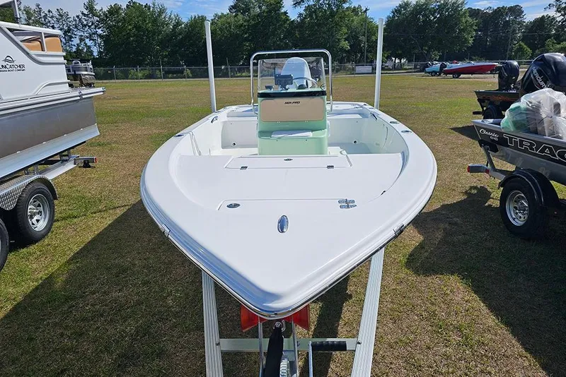 Slide: The Image of 2026 Sea Pro 172 Bay boat with Suzuki engine, open storage compartment. - 20