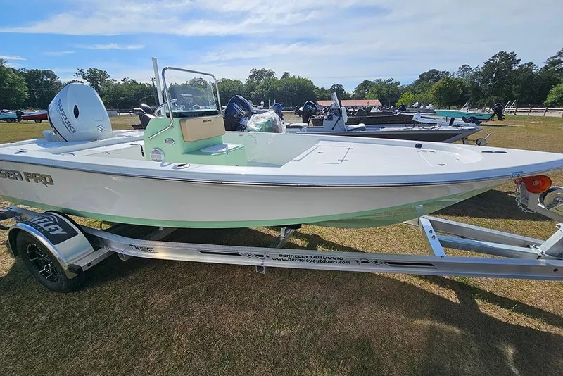 Slide: The Image of 2026 Sea Pro 172 Bay boat storage compartment with open hatch and certification labels. - 22