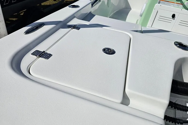Slide: The Image of 2026 Sea Pro 172 Bay boat interior with storage compartment and seating. - 25