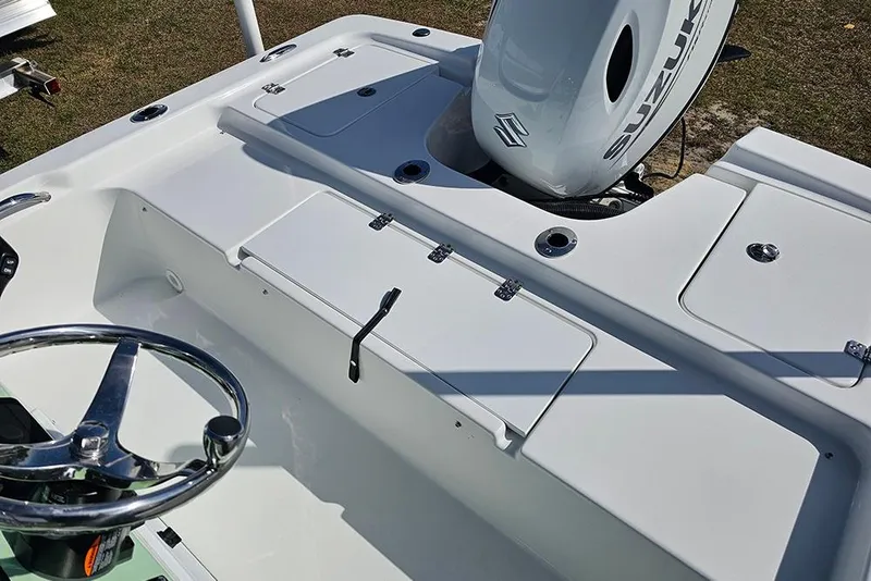 Slide: The Image of 2026 Sea Pro 172 Bay boat deck with storage compartments. - 27