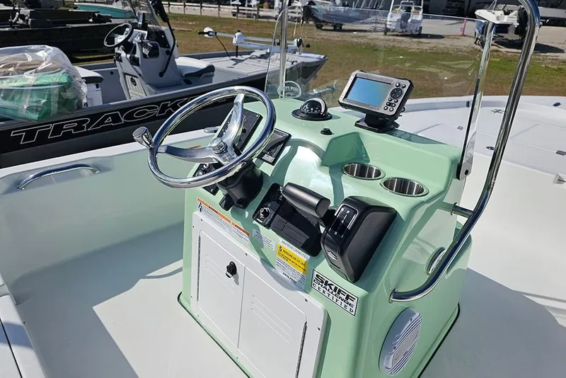 Slide: The Image of 2026 Sea Pro 172 Bay boat console with steering wheel and speaker. - 29