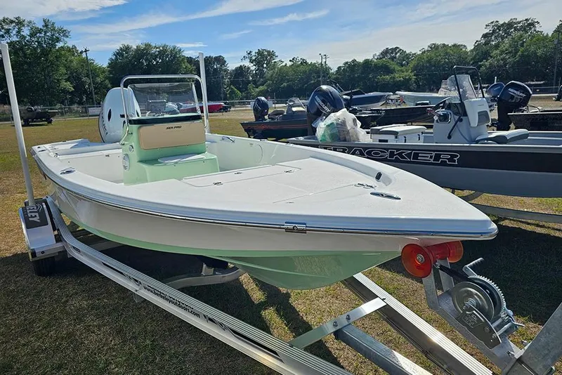 Slide: The Image of 2026 Sea Pro 172 Bay boat on trailer, featuring Suzuki outboard motor. - 5