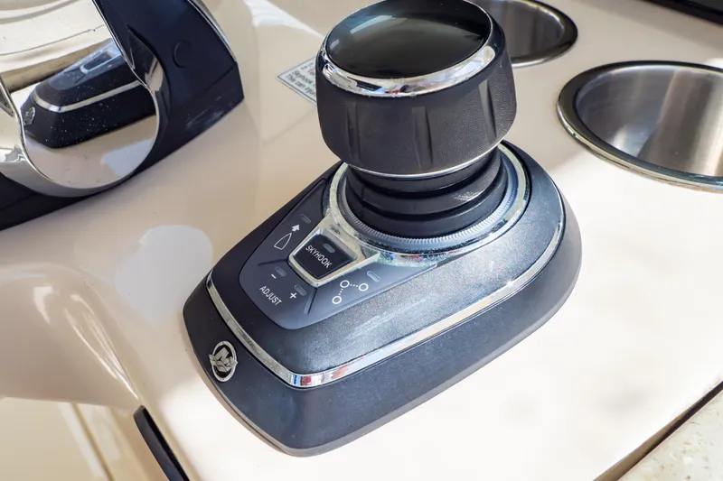 Slide: The Image of Joystick control on 2019 Boston Whaler 350 Realm boat dashboard. - 10