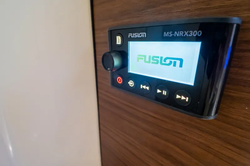 Slide: The Image of Fusion MS-NRX300 audio system on 2019 Boston Whaler 350 Realm boat. - 36